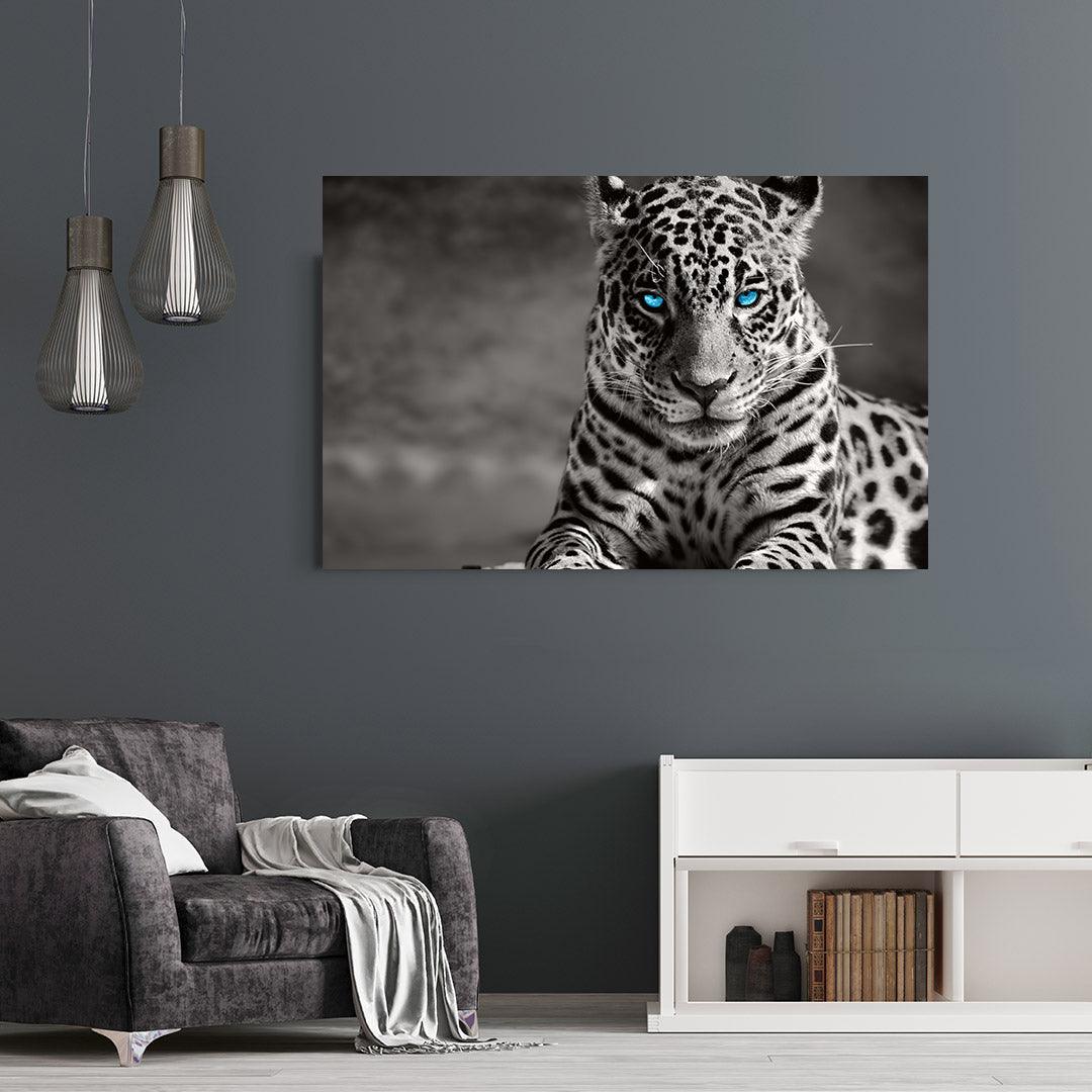 Leinwandbild - Leopard mit blauen Augen