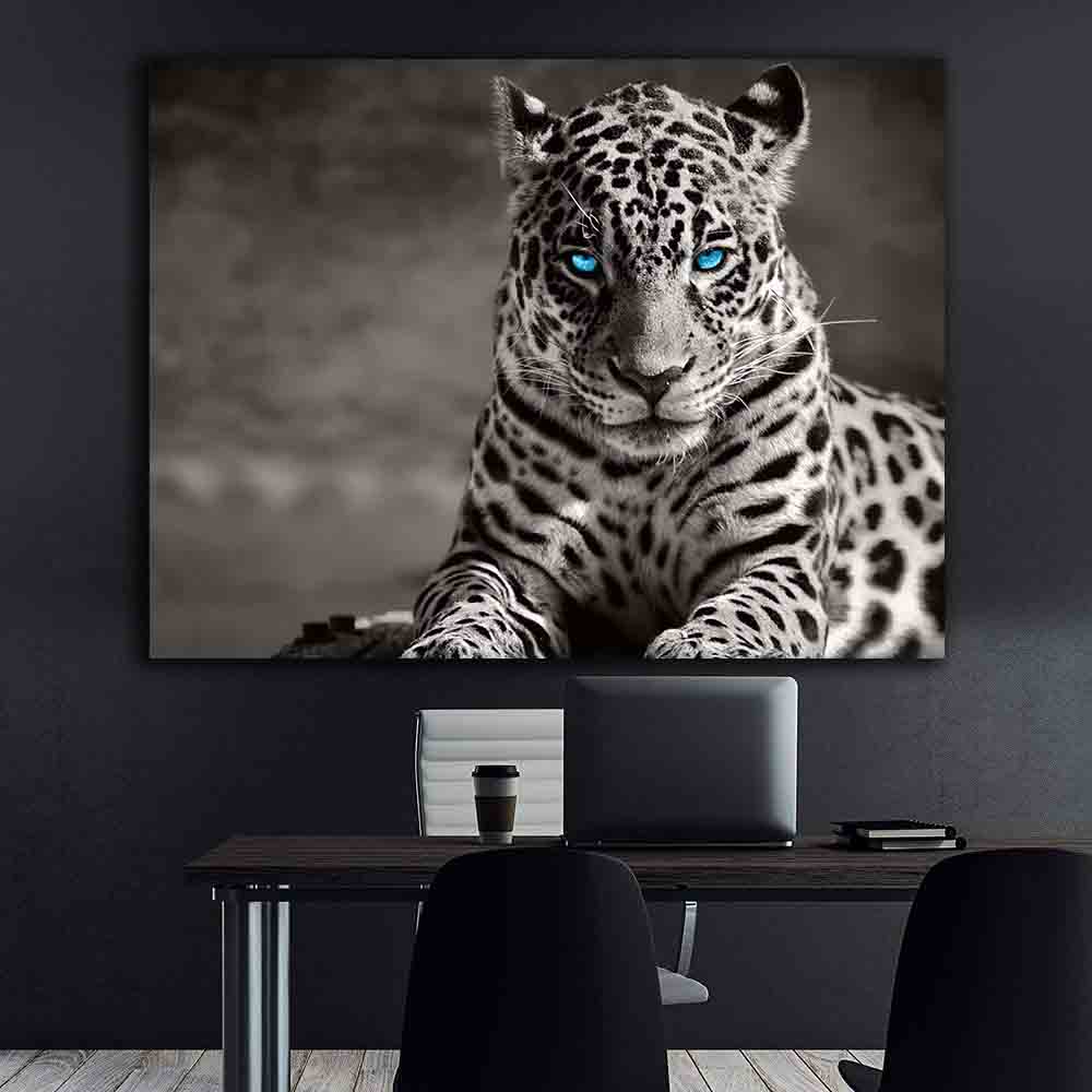 Leinwandbild - Leopard mit blauen Augen