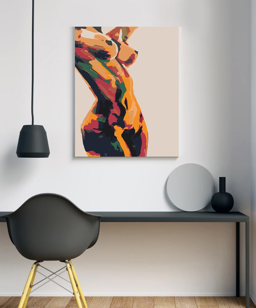 a painting of a woman's torso on a white wall